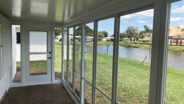 Covert Your Screened Patio with Acrylic Windows making a Weather-Resistant Sunroom!